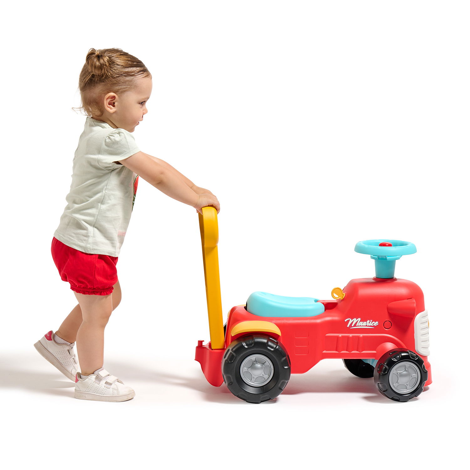 Barn skubber rød skubbetraktor med håndtag