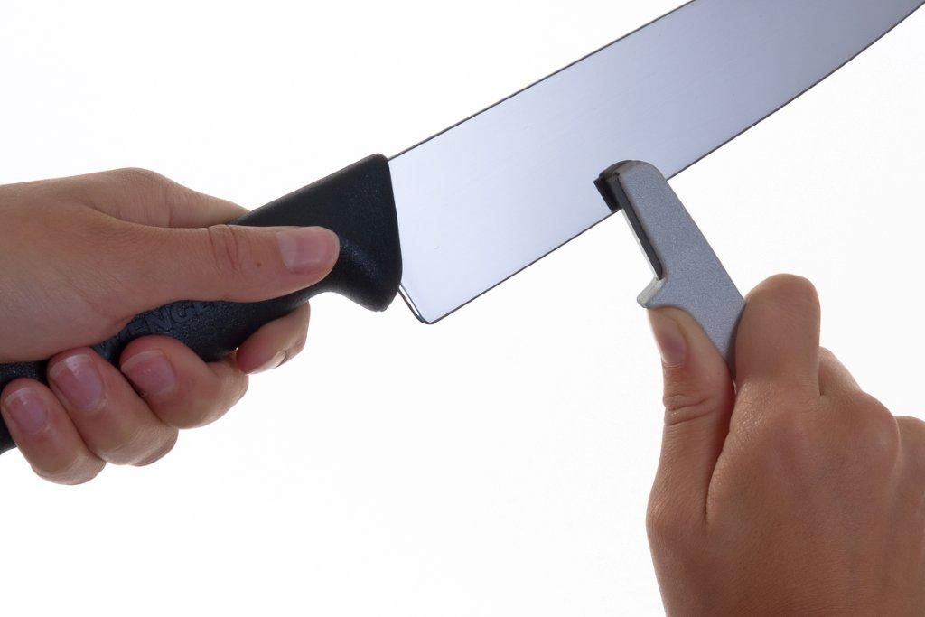 Håndholdt knivsliber der sliber køkkenkniv