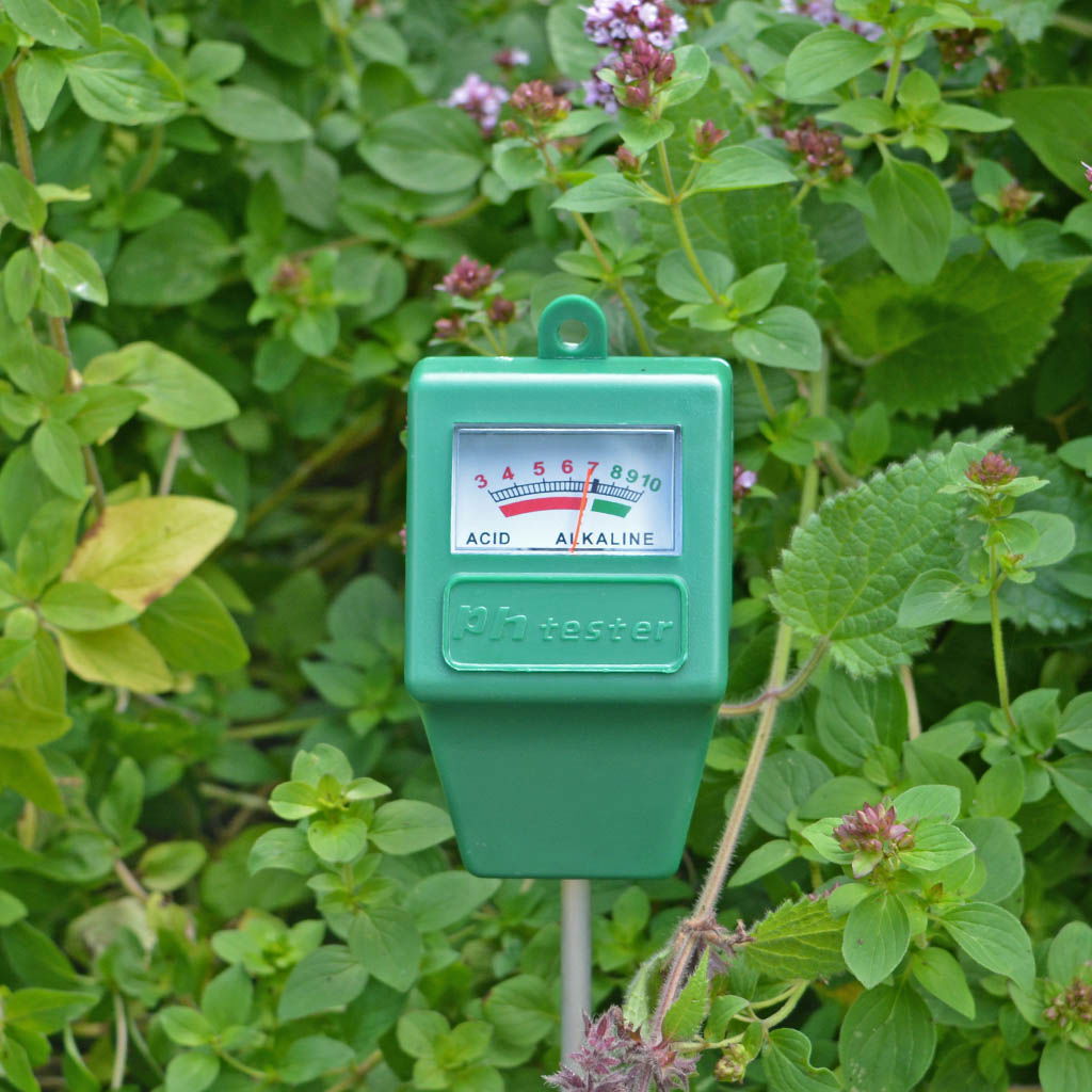 Grøn pH-måler til jord i haveplanter
