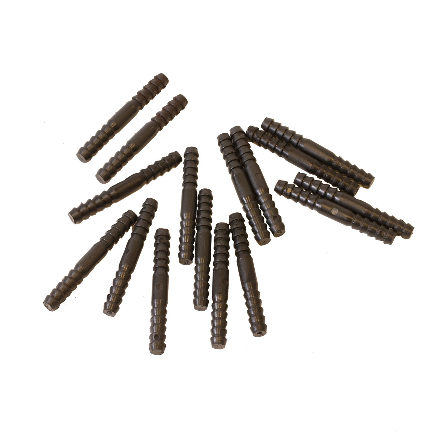 Flere sorte plastikdyvler på hvid baggrund